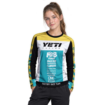 Yeti Cycles Factory Race Team 85 Teal Yellow Youth Long Sleeve Mountain Bike Jersey – Girl Lifestyle View
